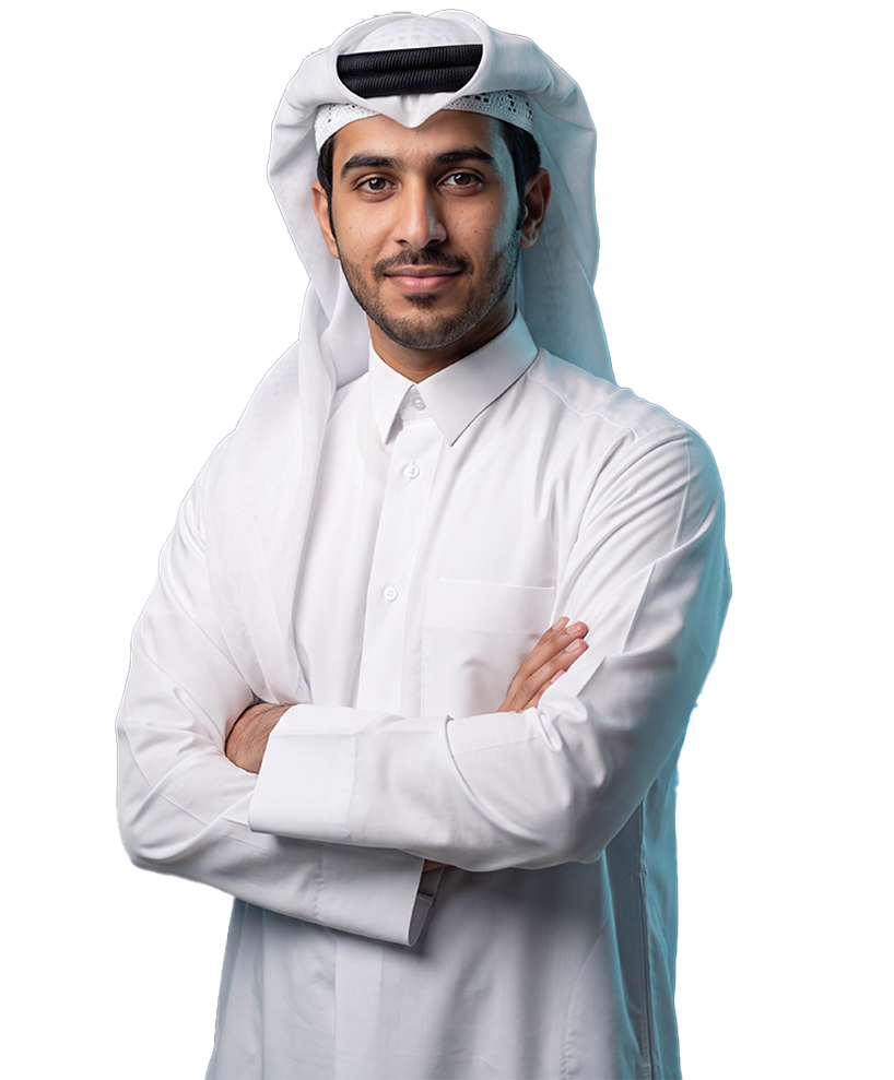 HBKU student in a white thobe and ghutra standing with his arms crossed